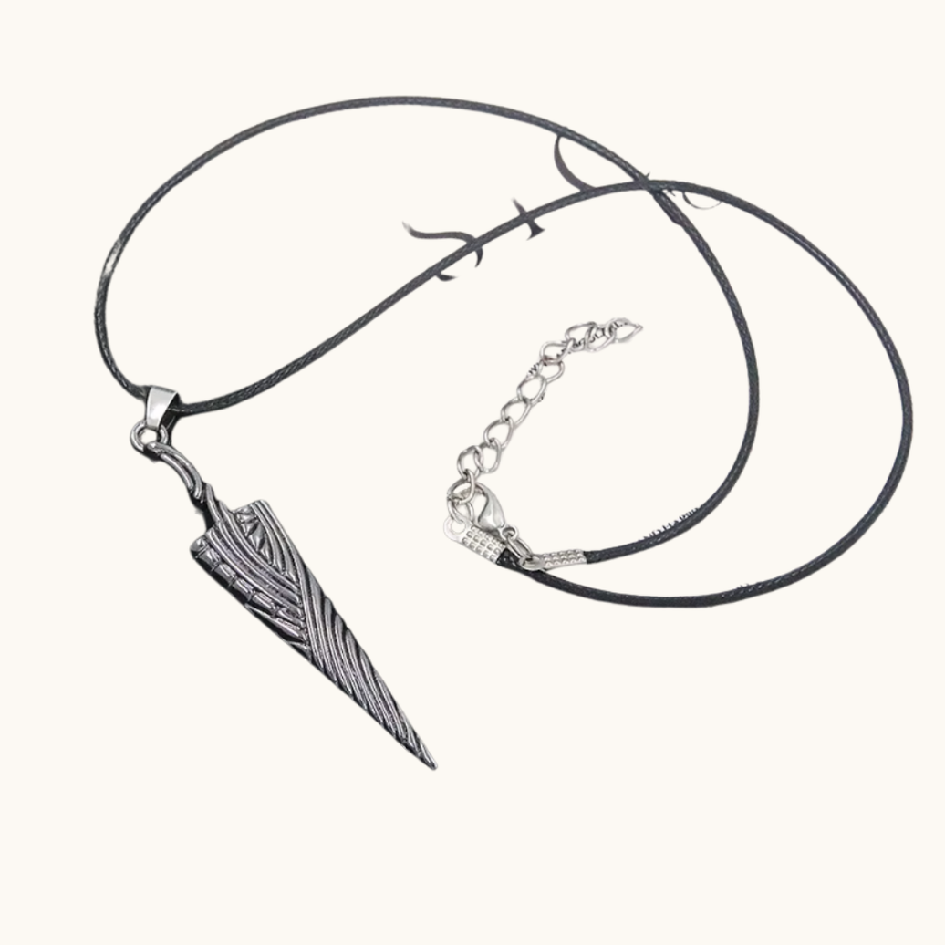 Pixel Bit Hollow Knight necklace pendant featuring a detailed, silver-colored charm of the Hollow Knight character on a chain.