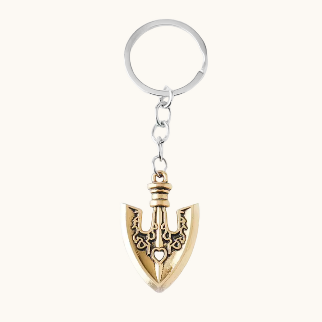 Metal keychain featuring Jotaro Kujo's arrow from JoJo's Bizarre Adventure, by Pixel Bit, with detailed character design.