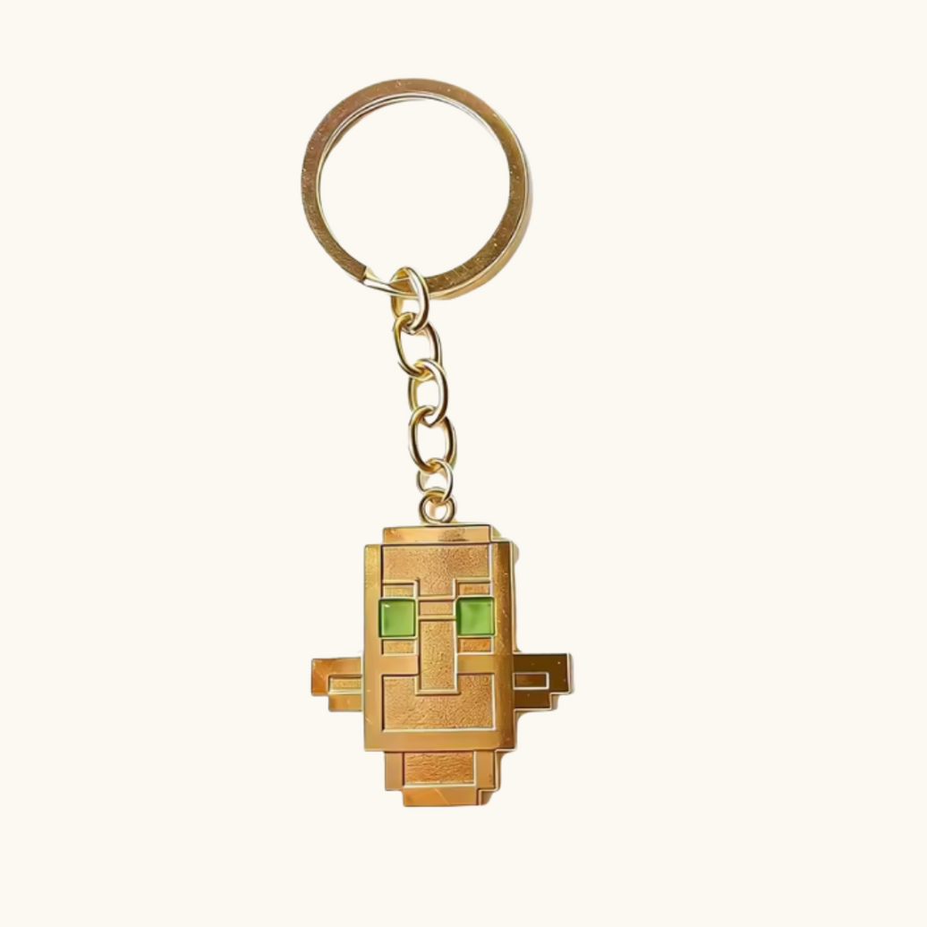 Pixel Bit Totem of Undying keychain featuring a detailed miniature replica of the iconic in-game totem, attached to a metal keychain.